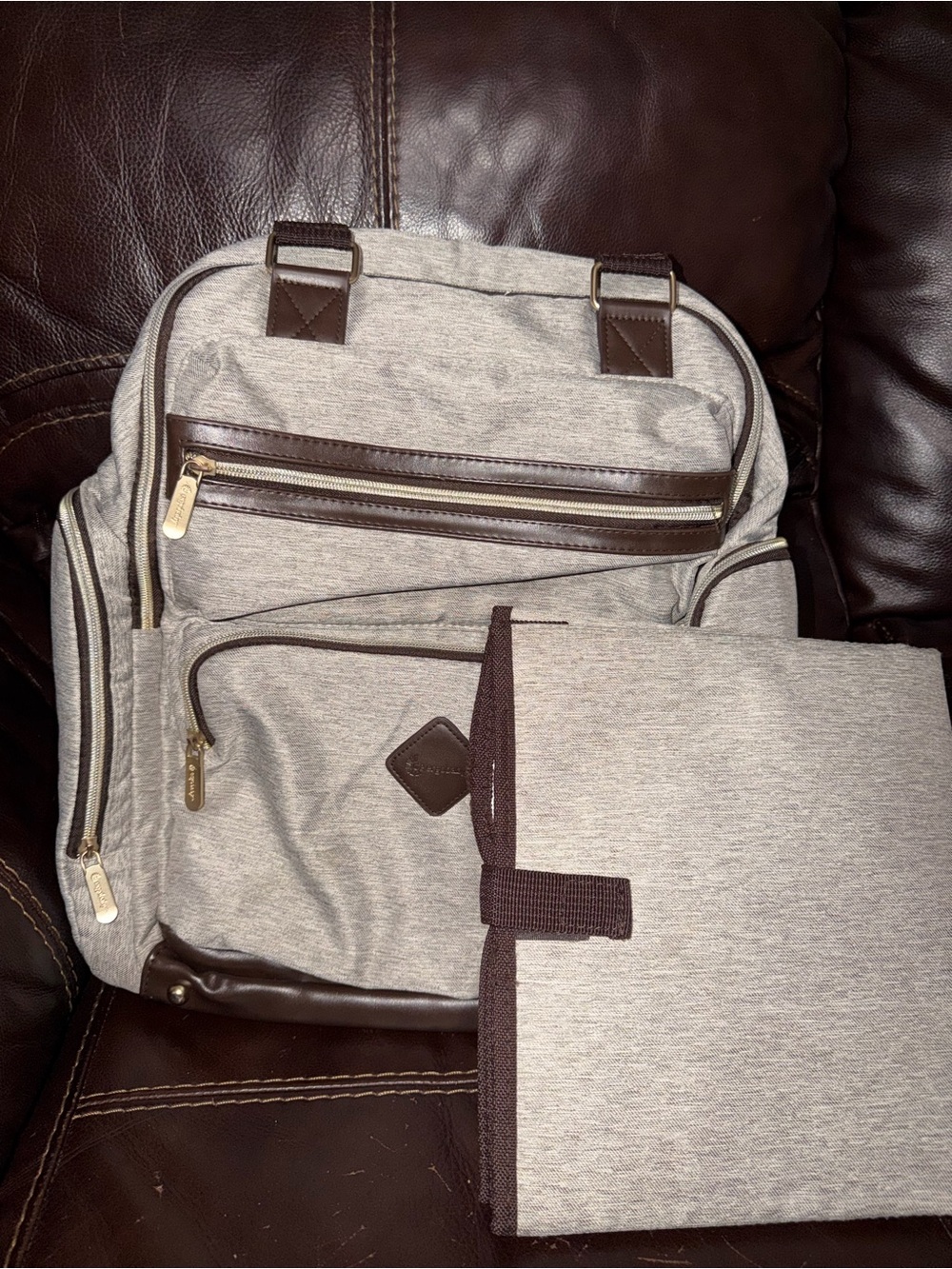 Ergobaby Beige Canvas Diaper Backpack with Dark Brown Leather Trim